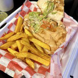 Restaurante Guatemalteco Dos Hermanos - Chicken torta served with fries
