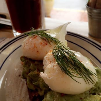 The Corner - Avocado toast with poached eggs with their cold brew coffee - Cafes Near Me - Montclair, New Jersey The Corner - Avocado toast with poached eggs with their cold brew coffee - Cafes Near Me - Montclair, New Jersey