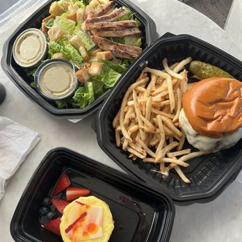 Chelsea Five - Our food.  Grilled chicken caesar salad Cheeseburger & fries Cheesecake. - Gastropubs Near Me - Atlantic City, New Jersey