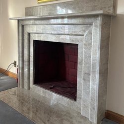 Onyx Marble & Granite - Taj Mahal Quartzite Fireplace