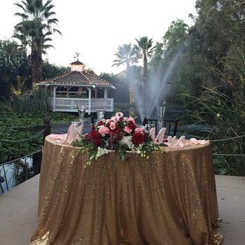 Floral Sensations - Sweetheart table with beautiful gold table cloth (by floral sensations), amazing flowers and extra rose petals!:) - Florists Near Me - Riverside, California