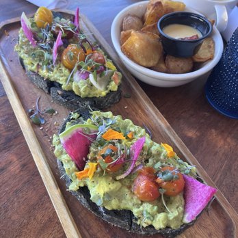 Cafe on 27 - The plenty avocado toast with a side of patatas bravas - Breakfast & Brunch Near Me - Topanga, California