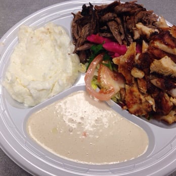Karam Restaurant - Gyro platter with chicken and lamb, lemon garlic sauce, salad, tahini - Middle Eastern Near Me - Brooklyn, New York