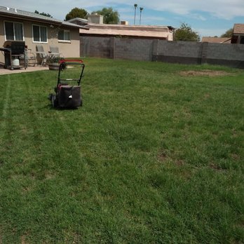 AZ Verde Landscaping - a lawn mower in a backyard - Landscaping Near Me AZ Verde Landscaping - a lawn mower in a backyard - Landscaping Near Me