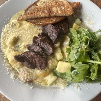 Blind Tiger Pub - gnoochi with hanger steak - American Near Me - Charleston, South Carolina