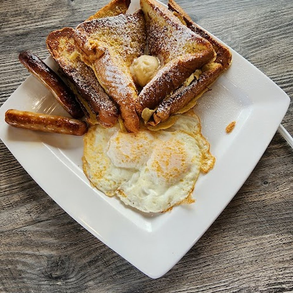 The Pan - French toast, sausage and eggs. Eggs were over easy, not medium as requested. - Breakfast & Brunch Near Me - Santa Ana, California The Pan - French toast, sausage and eggs. Eggs were over easy, not medium as requested. - Breakfast & Brunch Near Me - Santa Ana, California