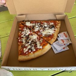 Giovanni's Pizza Stand - Pepperoni and mushroom pizza slices