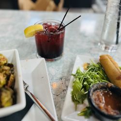 1229 Shine - Food: Brussels Sprouts and Spinach Mozzarella Rolls  Drink: BlackBerry Gin Fizzy