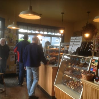 Demitasse - a man standing in front of a bakery counter - Bakeries Near Me - Victoria, British Columbia Demitasse - a man standing in front of a bakery counter - Bakeries Near Me - Victoria, British Columbia