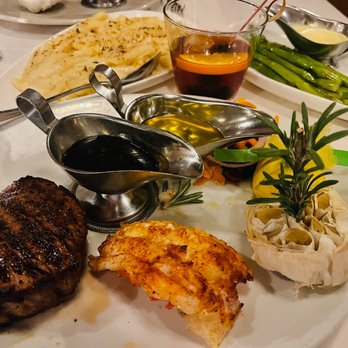 Prime Steakhouse - a plate of food on a table - Steakhouses Near Me - Key West, Florida