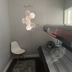 Roots Health Center - Red Light Bed for faster fat loss, skin tightening, and pain management.