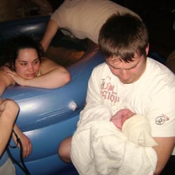 GraceFull Birthing - about to birth the placenta while daddy enjoys his little girl