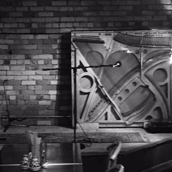 218 Taphouse - a black and white photo of a piano - Beer Bar Near Me - Virginia, Minnesota