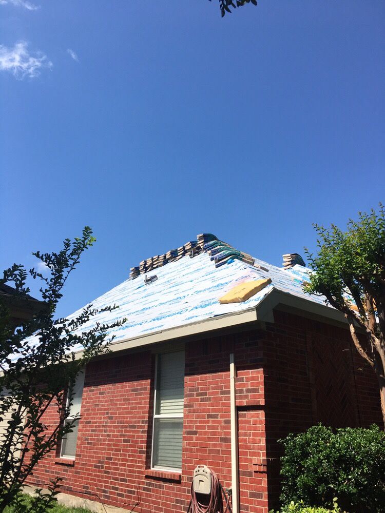 Slide of Chago's Roofing