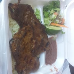 El Pulgarcito Grill - The meat is soft (great quality of meat)! The rice, beans, and salad is great