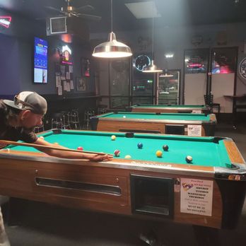 Pitchers Sports Restaurant - My hubby playing a game of pool - Sports Bars Near Me - Aurora, Colorado Pitchers Sports Restaurant - My hubby playing a game of pool - Sports Bars Near Me - Aurora, Colorado