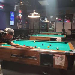 Pitchers Sports Restaurant - My hubby playing a game of pool