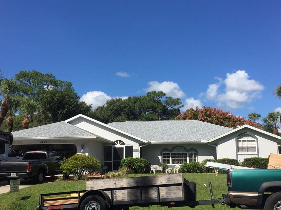 Slide of Tom Joyce Roofing