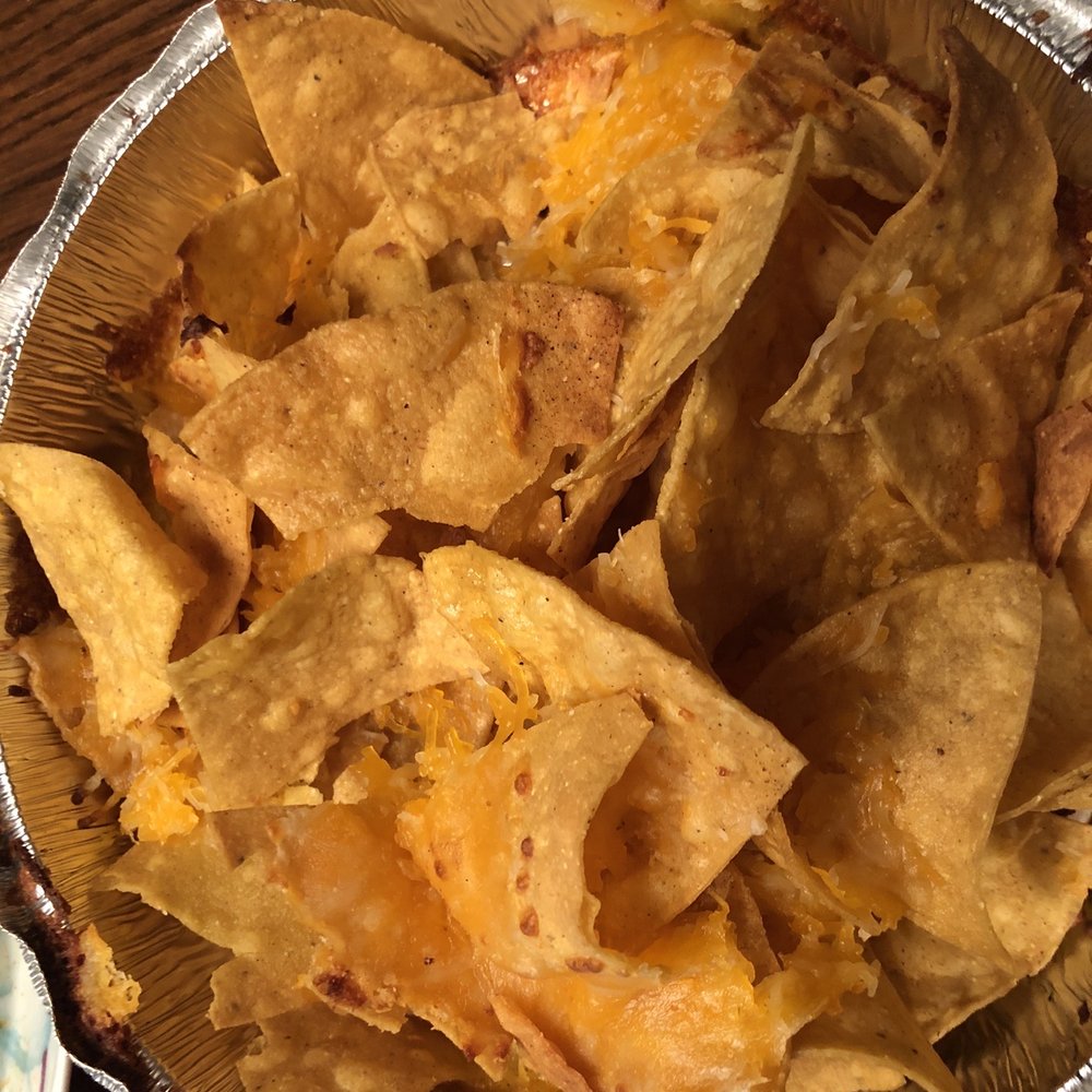 "Masterpiece" nachos! No sour cream...no guacamole...no salsa...no jalapeños...and no scallions! No masterpiece, just chips and cheese!! "Masterpiece" nachos! No sour cream...no guacamole...no salsa...no jalapeños...and no scallions! No masterpiece, just chips and cheese!!