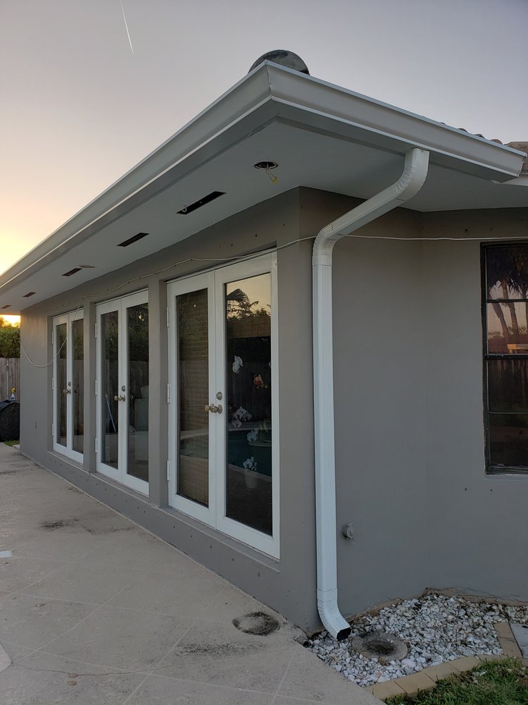 Slide of Del Toro Rain Gutters and Roofing