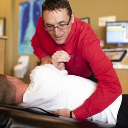 Synergy Spine & Nerve Center - We specialize in structural correction and long-term family wellness.