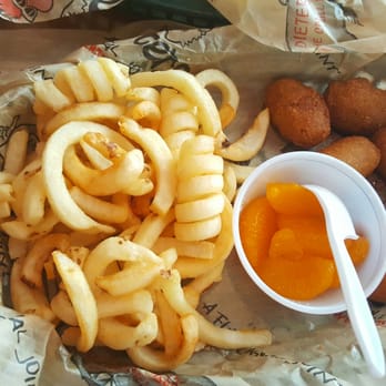 Rooster's - Mini corn dogs with curly fries and mandarin oranges. She said they were good. - Chicken Wings Near Me - Bowling Green, Kentucky Rooster's - Mini corn dogs with curly fries and mandarin oranges. She said they were good. - Chicken Wings Near Me - Bowling Green, Kentucky