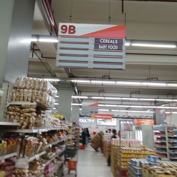 Tiongsan - Incomplete aisle sign - Shopping Centers Near Me - La Trinidad, BEN