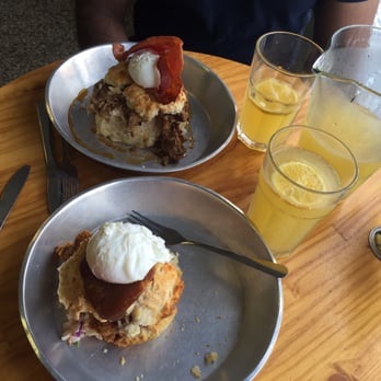 Biscuit Head - Pulled pork biscuit and mimosa friend chicken biscuit along with mimosa. THE BEST!! - Cafes Near Me - Asheville, North Carolina