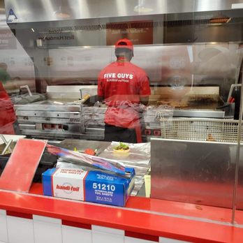 Five Guys - the kitchen of a fast food restaurant - Burgers Near Me - Brooklyn, New York Five Guys - the kitchen of a fast food restaurant - Burgers Near Me - Brooklyn, New York