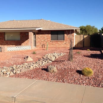 Landscape Pros & Design - the front yard of a home - Landscaping Near Me
