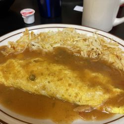 Home Plate Restaurant - Green Chili Smothered Omelet and hash browns