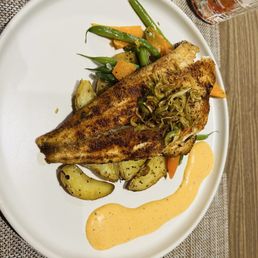 Blackened red drum with fresh vegetables