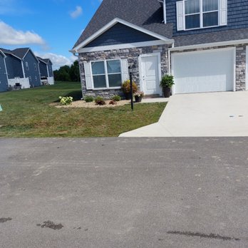 Nick’s Lawn Care - a driveway in front of a house - Lawn Services Near Me Nick’s Lawn Care - a driveway in front of a house - Lawn Services Near Me