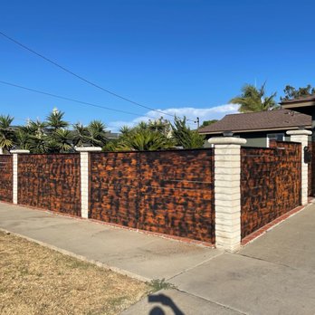 Eccentric Landscape Designs - After the fire stain. They were also able to stain the pillars black - Landscaping Near Me Eccentric Landscape Designs - After the fire stain. They were also able to stain the pillars black - Landscaping Near Me