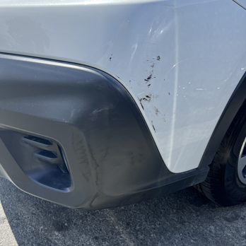 Fix My Bumper - Before where the bumper was hit while parked by another car's bumper. - Body Shops Near Me Fix My Bumper - Before where the bumper was hit while parked by another car's bumper. - Body Shops Near Me