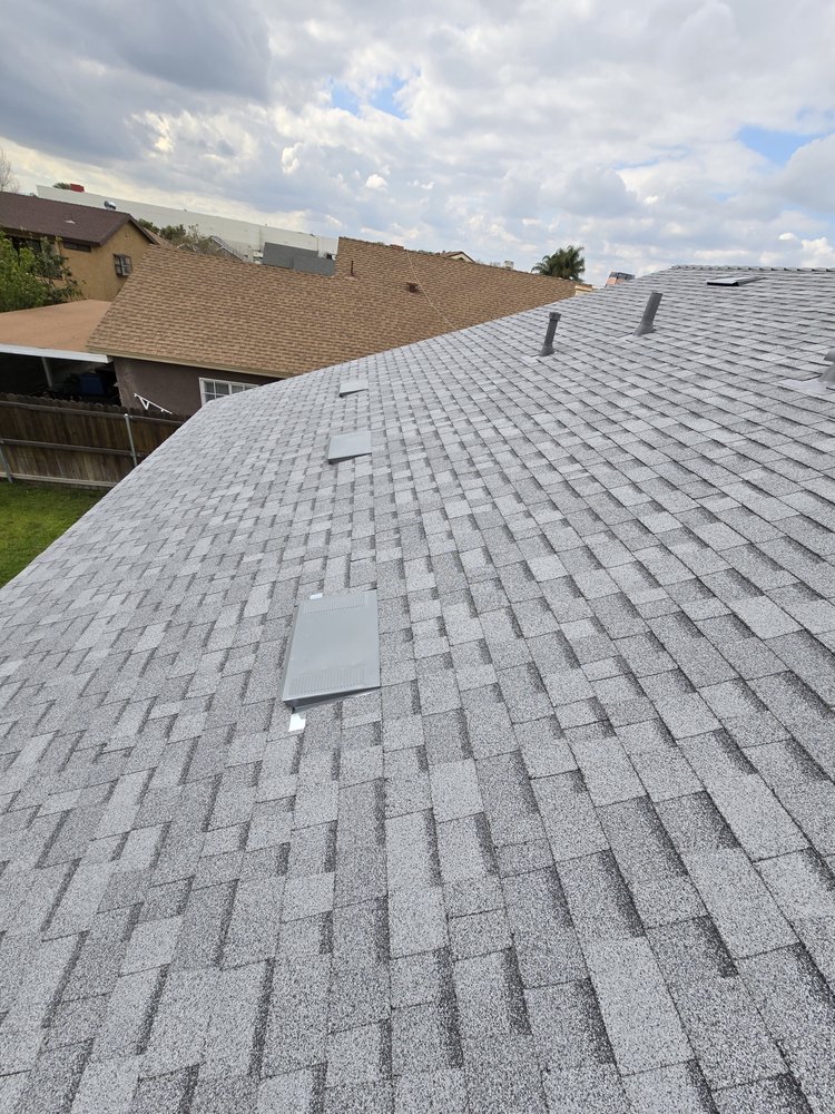 Slide of Eminent Roofing