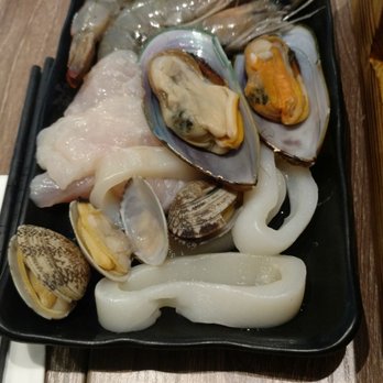 Uniboil - Shrimp, squid, clams, mussels, and fish that came with the seafood hotpot - Asian Fusion Near Me - Goleta, California Uniboil - Shrimp, squid, clams, mussels, and fish that came with the seafood hotpot - Asian Fusion Near Me - Goleta, California