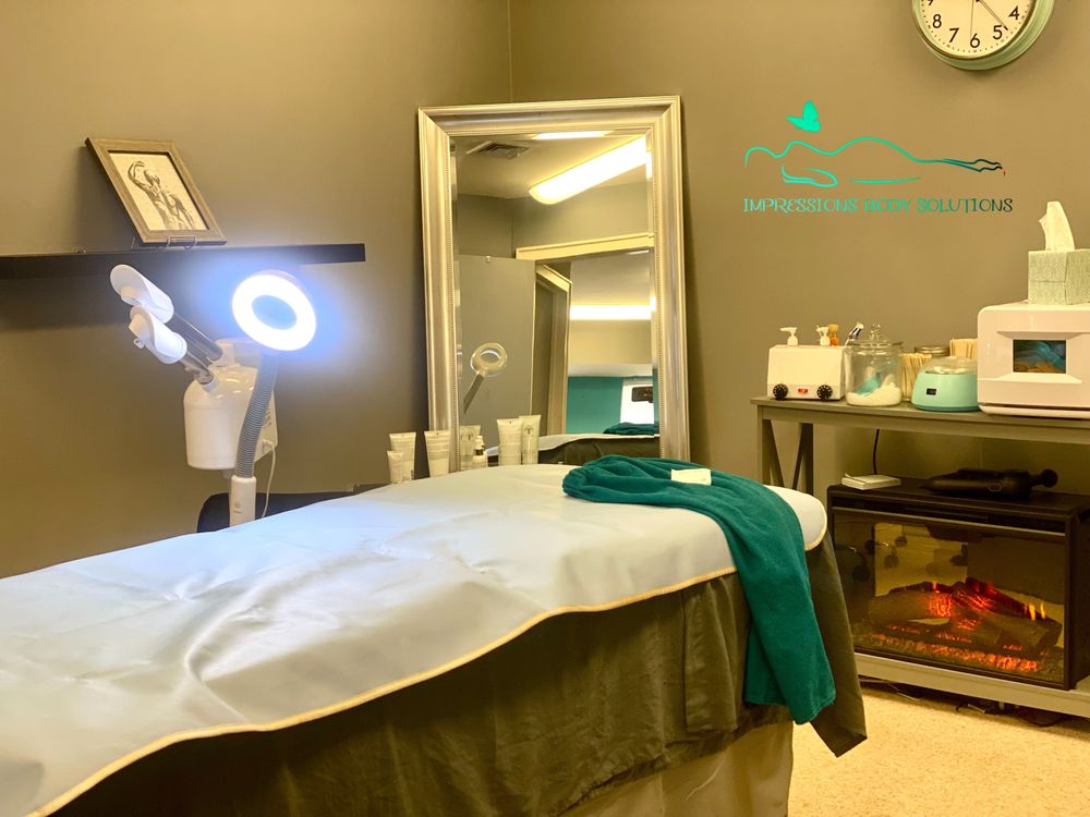 Impressions Body Solutions Logo