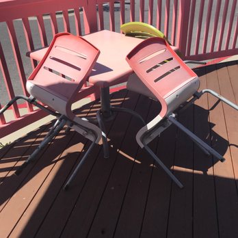 Yogo Mogos - a table and chairs on a deck - Ice Cream & Frozen Yogurt Near Me - Fort Walton Beach, Florida Yogo Mogos - a table and chairs on a deck - Ice Cream & Frozen Yogurt Near Me - Fort Walton Beach, Florida