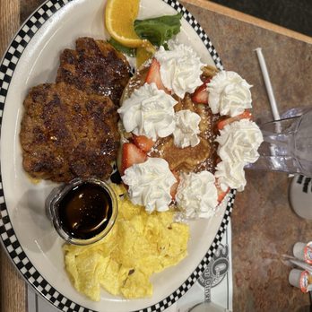 Black Bear Diner Richfield - Spicy sausage patty, eggs and waffle with strawberries and whipped cream - Diners Near Me - Richfield, Utah Black Bear Diner Richfield - Spicy sausage patty, eggs and waffle with strawberries and whipped cream - Diners Near Me - Richfield, Utah
