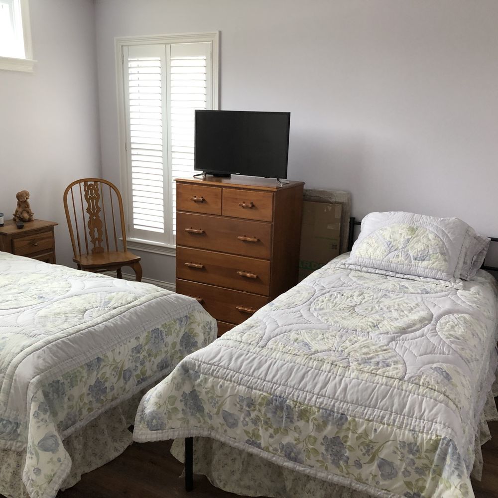 Wyatt Builders - 2nd bedroom, setup as guestroom (photo gives a distorted view of room. The room is much larger than it appears in photo.) - General Contractors Near Me - Crossville, Tennessee