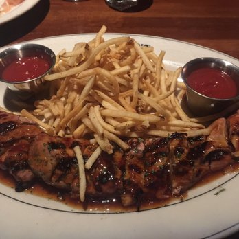J. Alexander's - Grilled pork tenderloin , with the best French fries in town (except McD )shoe string fries and fresh ketchup - Steakhouses Near Me - Plantation, Florida J. Alexander's - Grilled pork tenderloin , with the best French fries in town (except McD )shoe string fries and fresh ketchup - Steakhouses Near Me - Plantation, Florida