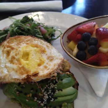 Kanela Breakfast Club - Avocado toast with fried egg - Breakfast & Brunch Near Me - Chicago, Illinois Kanela Breakfast Club - Avocado toast with fried egg - Breakfast & Brunch Near Me - Chicago, Illinois