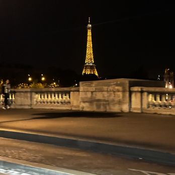 Eiffel Tower, Paris France - At night - Landmarks & Historical Buildings Near Me - Paris Eiffel Tower, Paris France - At night - Landmarks & Historical Buildings Near Me - Paris