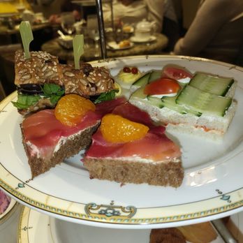 Palm Court - Raw salmon on maybe Rye bread and   cucumber slices on white bread with some kind of whipped icing in the middle - Bars Near Me - Chicago, Illinois