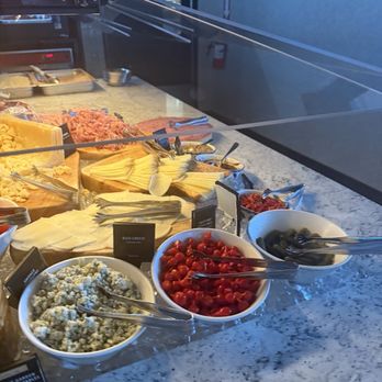 Fogo de Chão - Different toppings for your salad and lots of cheese - Brazilian Near Me - Portland, Oregon