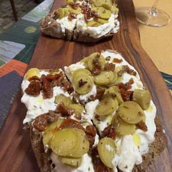 Enoteca Internazionale - Appetizer with Stracciatella cheese which - Italian Near Me - Monterosso al Mare, SP Enoteca Internazionale - Appetizer with Stracciatella cheese which - Italian Near Me - Monterosso al Mare, SP