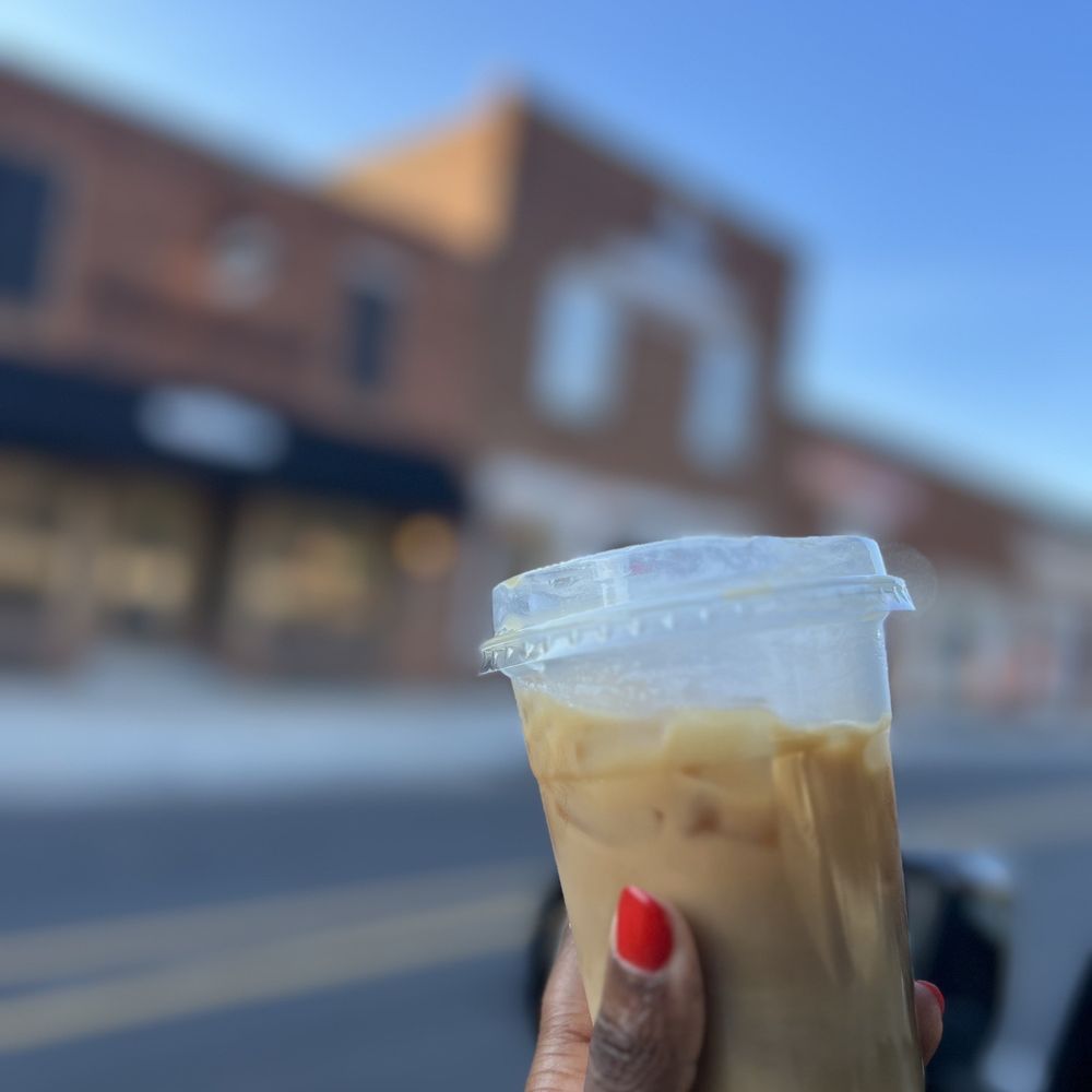 Coffee Republic - a hand holding a cup of coffee - Coffee & Tea Near Me - Huntersville, North Carolina Coffee Republic - a hand holding a cup of coffee - Coffee & Tea Near Me - Huntersville, North Carolina