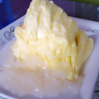 Nu Cafe - Mango shaved ice with lychee and syrup on top - Ice Cream & Frozen Yogurt Near Me - Houston, Texas Nu Cafe - Mango shaved ice with lychee and syrup on top - Ice Cream & Frozen Yogurt Near Me - Houston, Texas