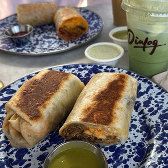 Dialog Cafe - Brisket Verde Breakfast Burrito (front) Dialog's Breakfast Burrito (back) - Cafes Near Me - West Hollywood, California Dialog Cafe - Brisket Verde Breakfast Burrito (front) Dialog's Breakfast Burrito (back) - Cafes Near Me - West Hollywood, California